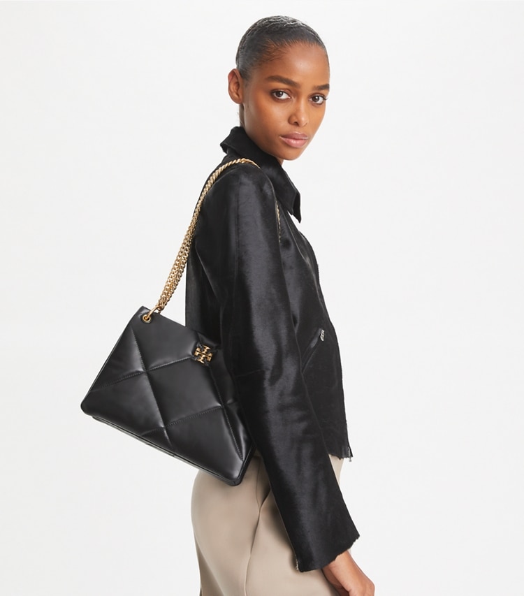 Tory Burch designer shoulder bags Small Kira Diamond Quilt Shoulder Bag in Black accessory on model