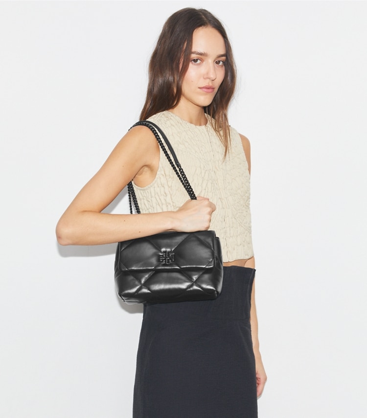Tory Burch designer shoulder bags Small Kira Diamond Quilt Shoulder Bag in Black accessory on model