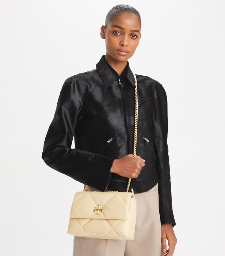 Tory Burch designer shoulder bags Small Kira Diamond Quilt Shoulder Bag in Vanilla Soft Serve additional on model