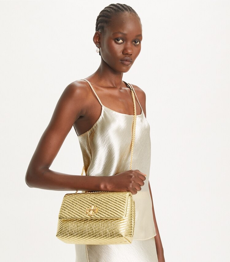 Tory Burch designer shoulder bags Small Kira Moto Quilt Metallic Convertible Shoulder Bag in Gold additional on model