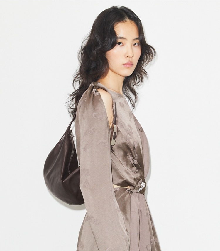 Tory Burch designer shoulder bags Small Leather Balloon Bag in Warm Mahogany accessory on model