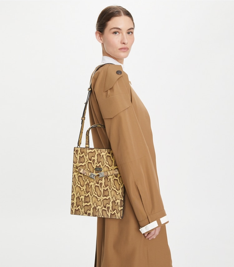 Tory Burch designer shoulder bags Small Lee Radziwill Embossed Shopper in Quince / Marten accessory on model
