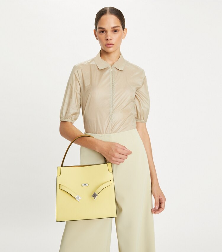 Tory Burch designer satchels Small Lee Radziwill Pebbled Double Bag in Lemon Sugar accessory on model