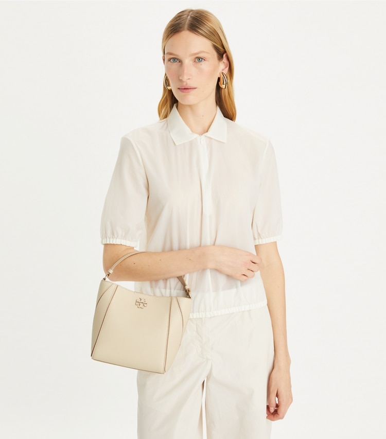 Tory Burch designer crossbody bags Small McGraw Bucket Bag in BRIE accessory on model
