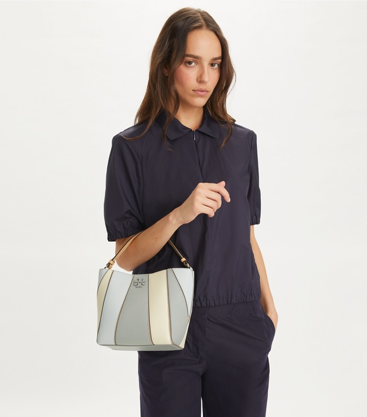 Tory Burch designer クロスボディバッグ マックグロー カラーブロック スモールバケットバッグ in Light Granite Multi additional on model