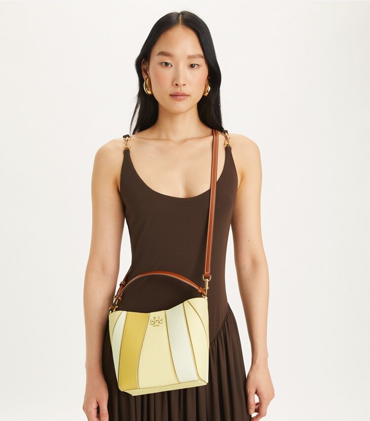Tory Burch designer クロスボディバッグ マックグロー カラーブロック スモールバケットバッグ in LEMON SWIRLMULTI additional on model