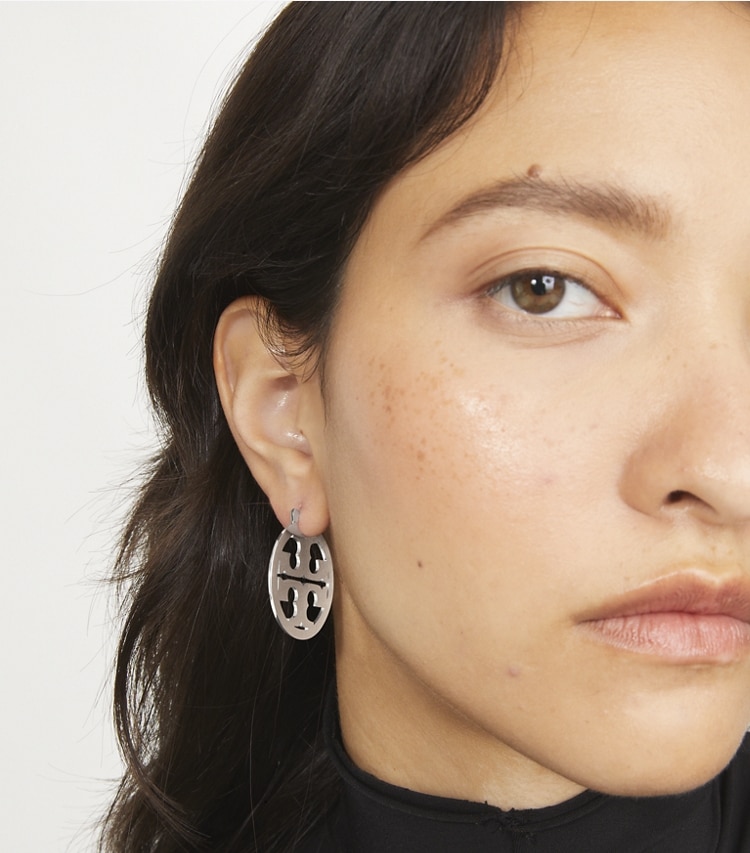 Tory Burch designer earrings Small Miller Hoop Earrings in Tory Gold accessory on model