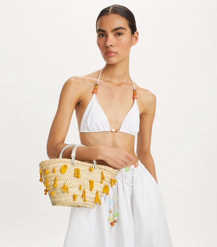Tory Burch designer tote bags Small Raffia Embroidered Tote in Cassia accessory on model