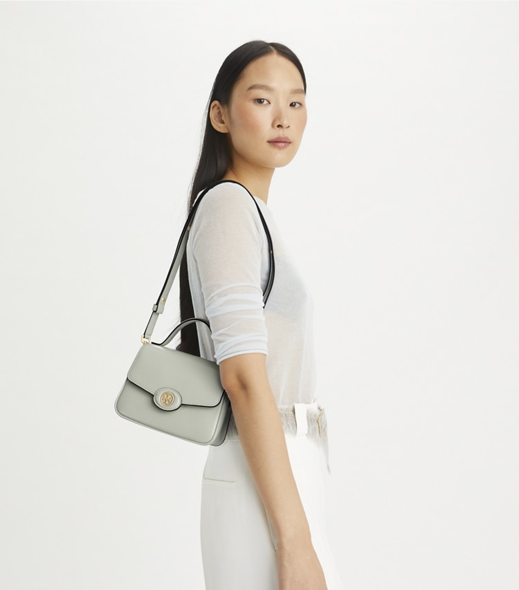 Tory Burch designer crossbody bags Small Robinson Spazzolato Top-Handle Bag in Light Granite accessory on model