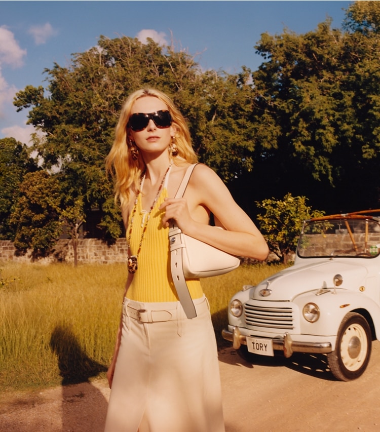 Tory Burch designer shoulder bags Small Romy Shoulder Bag in Light Cream campaign