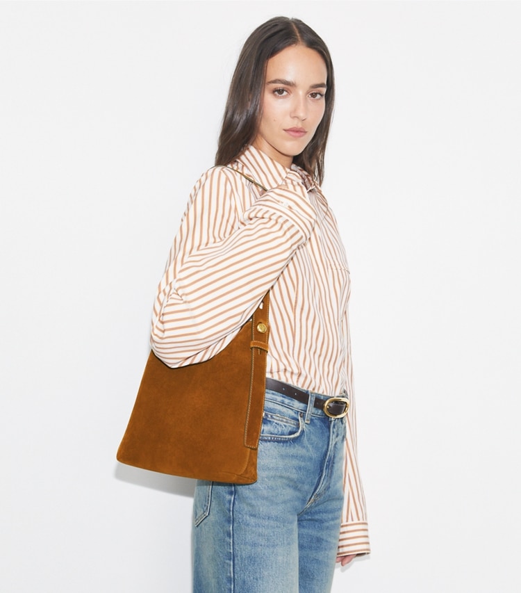 Tory Burch designer hobo bags Small Suede Hobo Bag in Cognac accessory on model