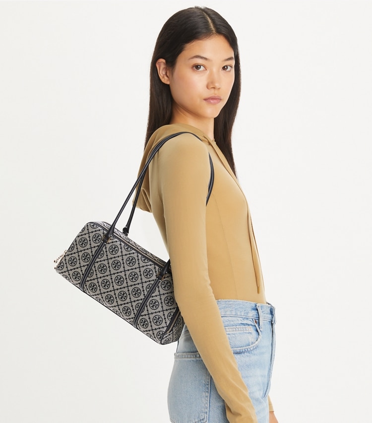 Tory Burch designer shoulder bags Small T Monogram Marshmallow Satchel in Tory Navy accessory on model