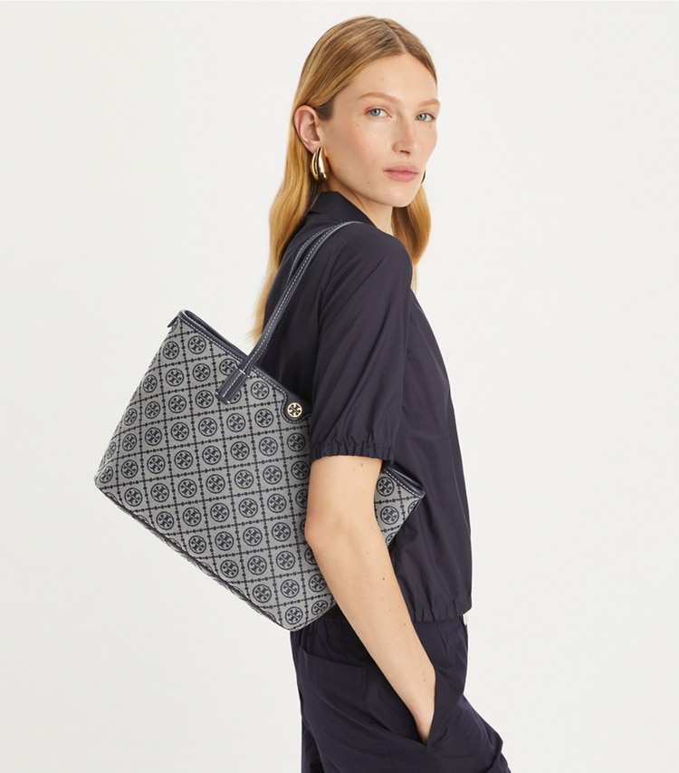 Tory Burch designer tote bags Small T Monogram Zip Tote in Tory Navy accessory on model
