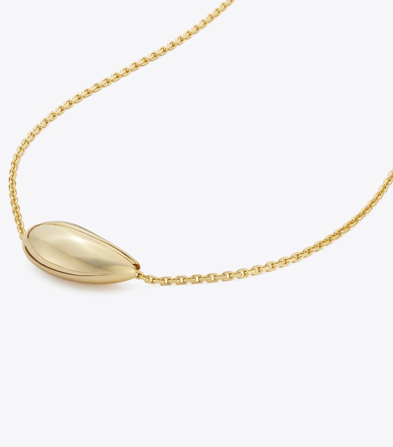 Tory Burch designer necklaces Small Wave Pendant in Light Brass front