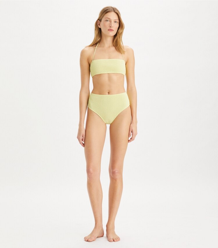 Tory Burch designer two pieces Smocked High-Leg High-Waisted Bikini Bottom in Lumen on model front