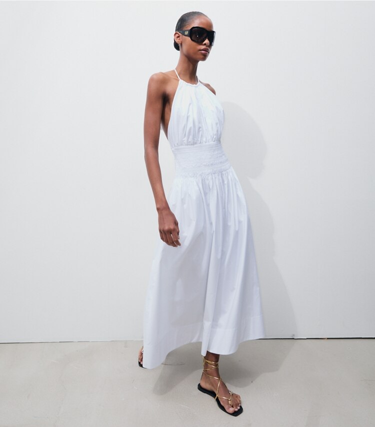Tory Burch designer dresses Smocked Poplin Halter Dress in White on model front