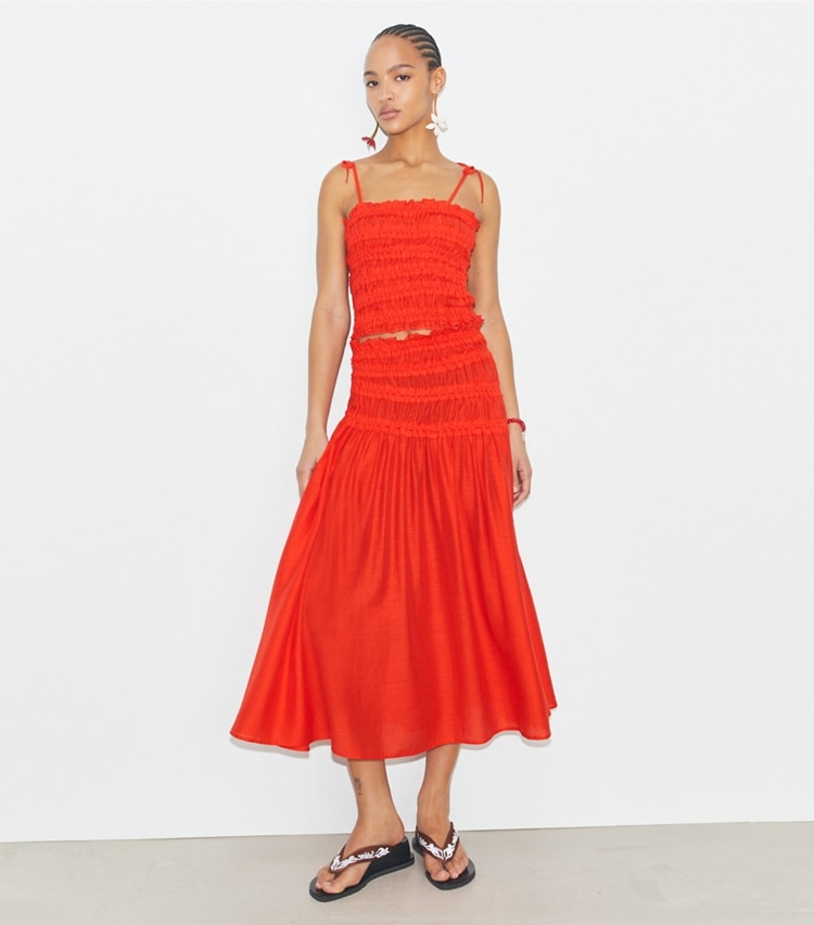 Tory Burch designer coverups Smocked Viscose Skirt in Deep Poppy on model front