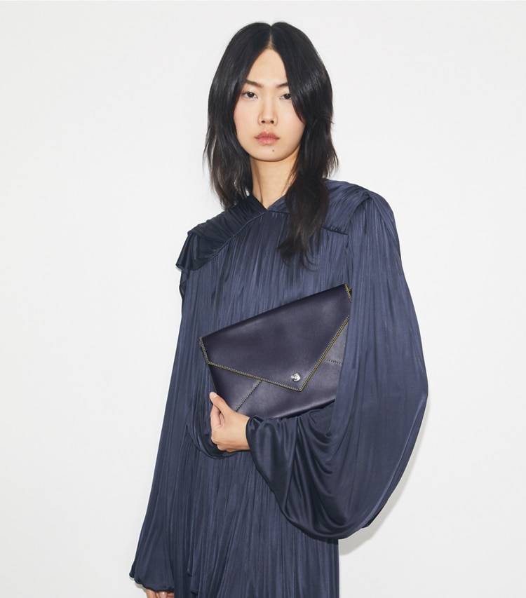 Tory Burch designer mini bags Smooth Leather Envelope Chain Pouch in Midnight additional on model