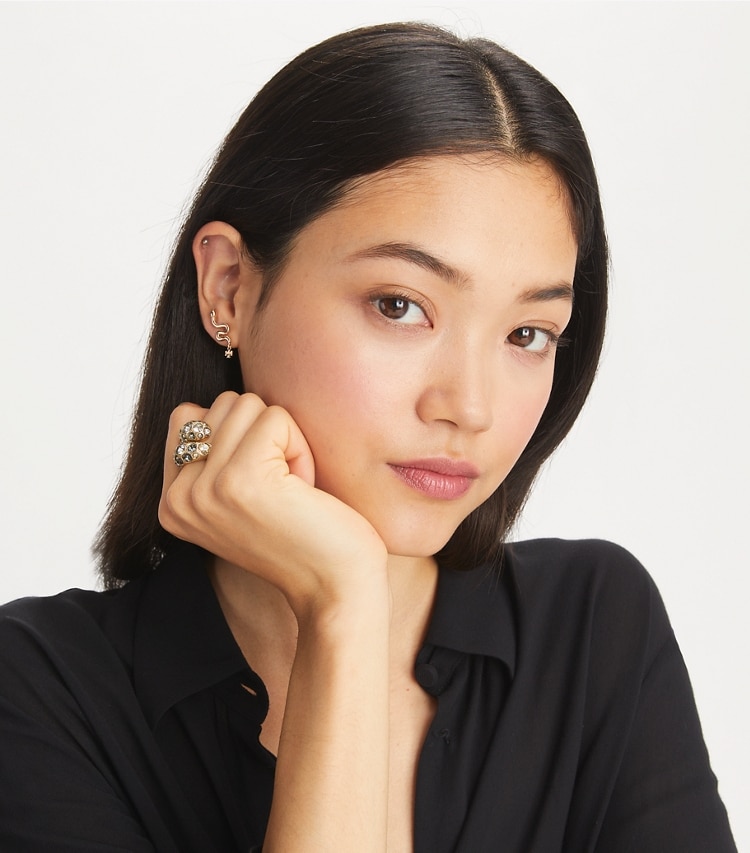 Tory Burch designer earrings Snake Stud Earring in Tory Gold accessory on model