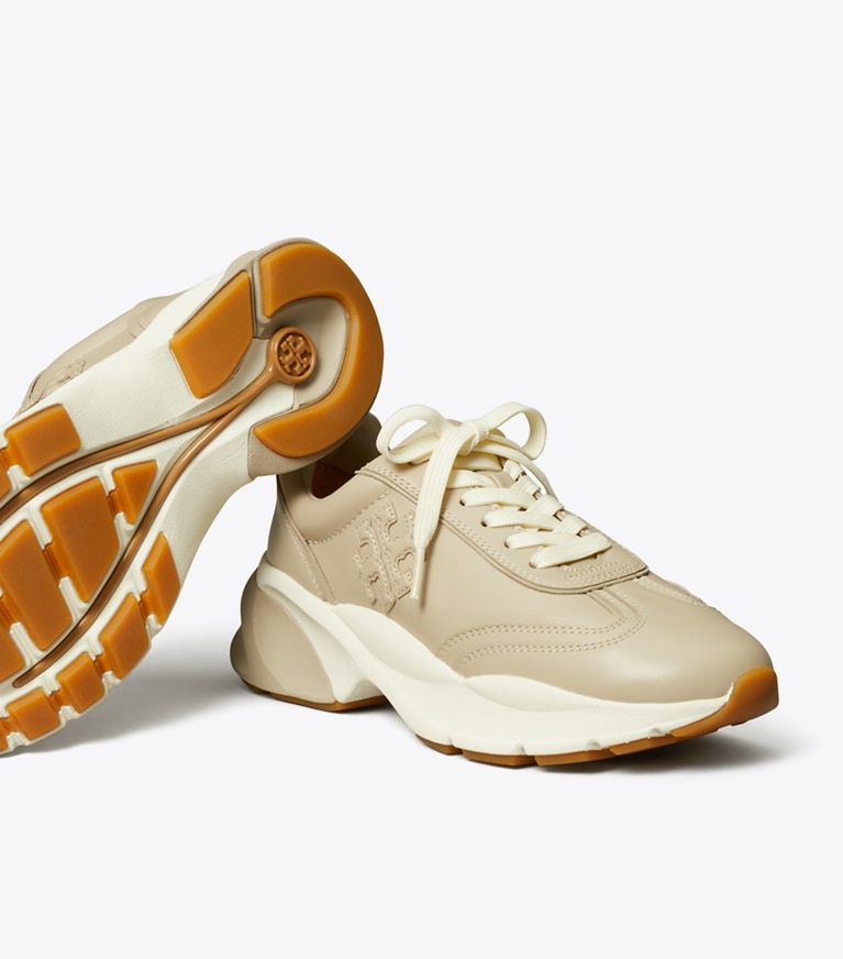 Tory Burch designer sneakers Sneaker Good Luck in STONE GREY angle