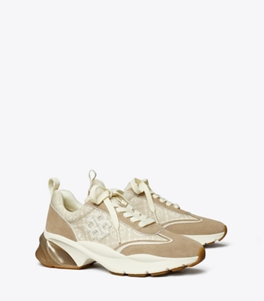 Tory Burch designer sneakers Sneaker Good Luck con T Monogram in BIRCH / AVOLA angle