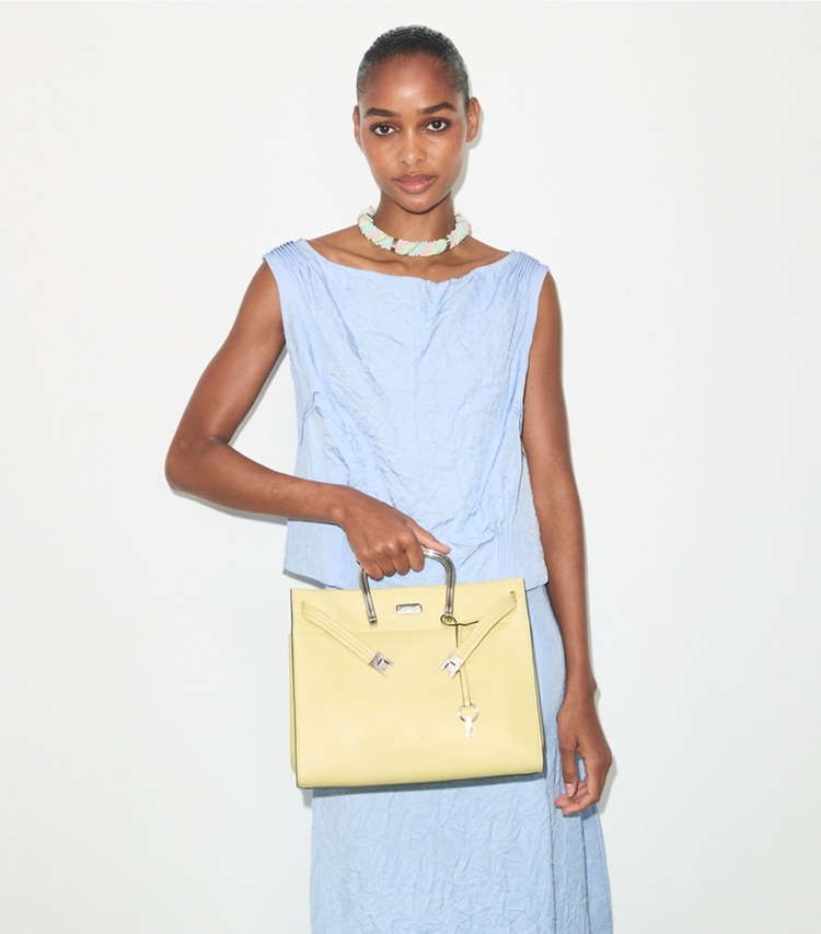 Tory Burch designer tote bags Soft Lee Radziwill Bag in Soft Yellow accessory on model