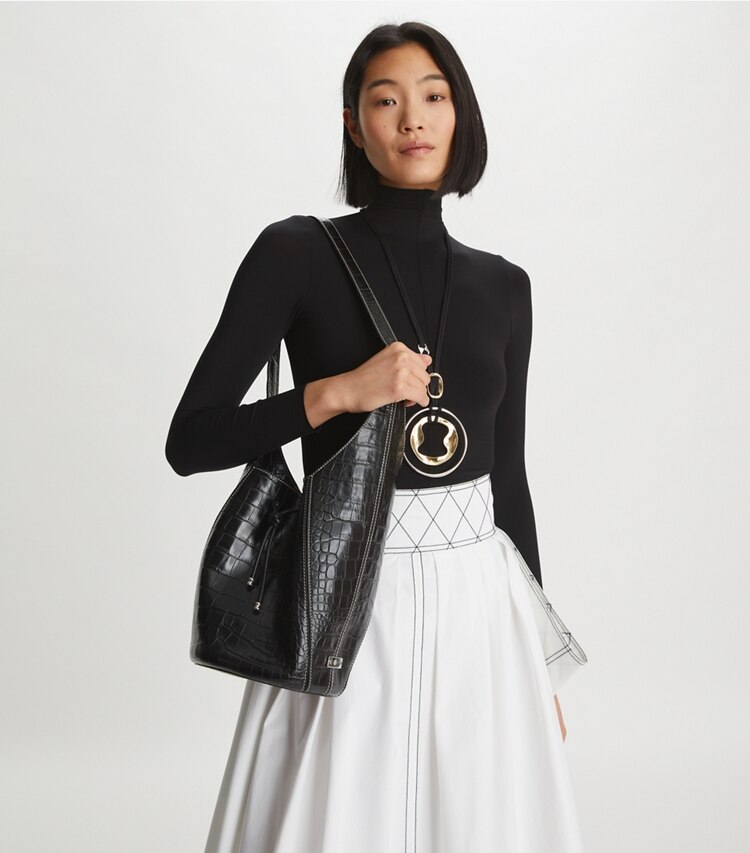 Tory Burch designer hobo bags Spaghetti Strap Embossed Bucket Bag in Black accessory on model