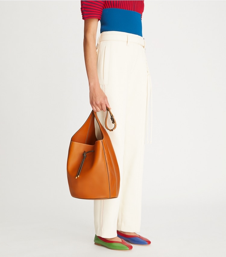 Tory Burch designer hobo bags Spaghetti Strap Large Bucket Bag in BOURBON additional on model