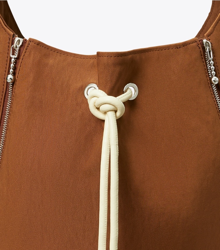 Tory Burch designer crossbody bags Spaghetti Strap Large Zip Bucket Bag in BOURBON VANILLA / French Cream angle
