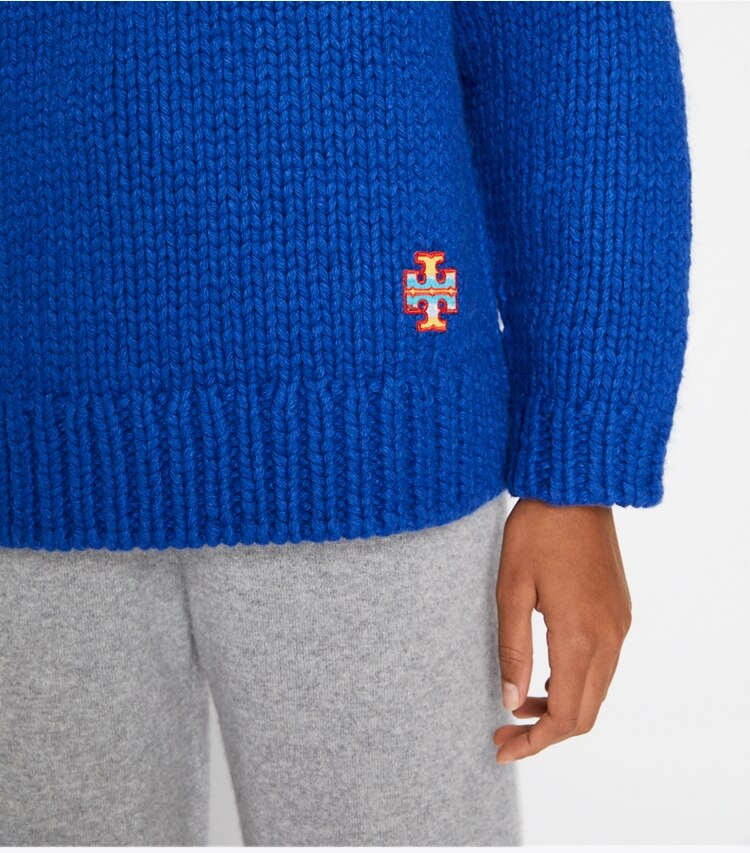 Tory Sport designer sweaters Speckled Hand Knit Mockneck Sweater in Slalom Blue on model detail