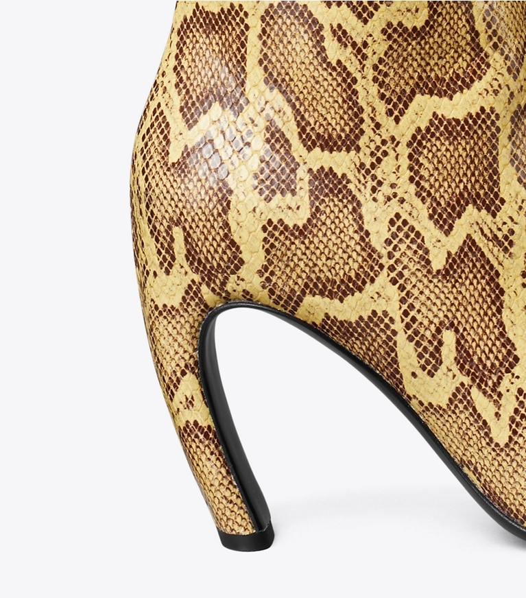 Tory Burch designer stivale Stivale alto in pelle a rilievo con effetto serpente in MIMOSA angle
