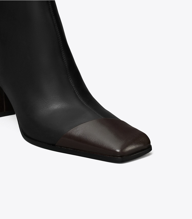 Tory Burch designer stivaletti Stivaletto a punta con design asimmetrico in PERFECT BLACK / COCO dettaglio