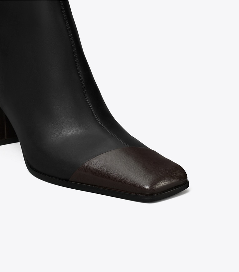 Tory Burch designer stivaletti Stivaletto a punta con design asimmetrico in PERFECT BLACK / COCO dettaglio