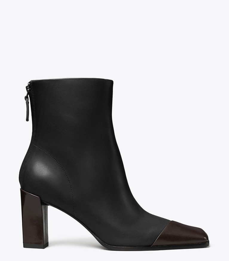 Tory Burch designer stivaletti Stivaletto a punta con design asimmetrico in PERFECT BLACK / COCO side