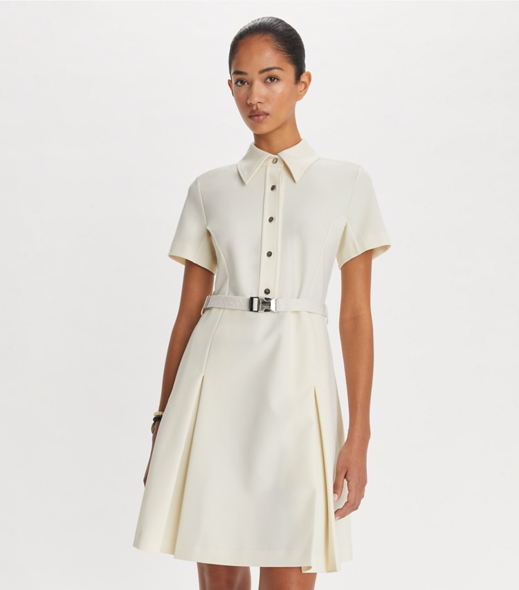 Tory Sport designer dresses Stretch Golf Dress in NEW IVORY on model detail