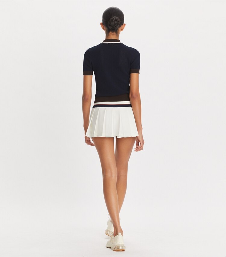 Tory Sport designer ボトムス ストレッチ ミニ テニススカート in Snow White on model back