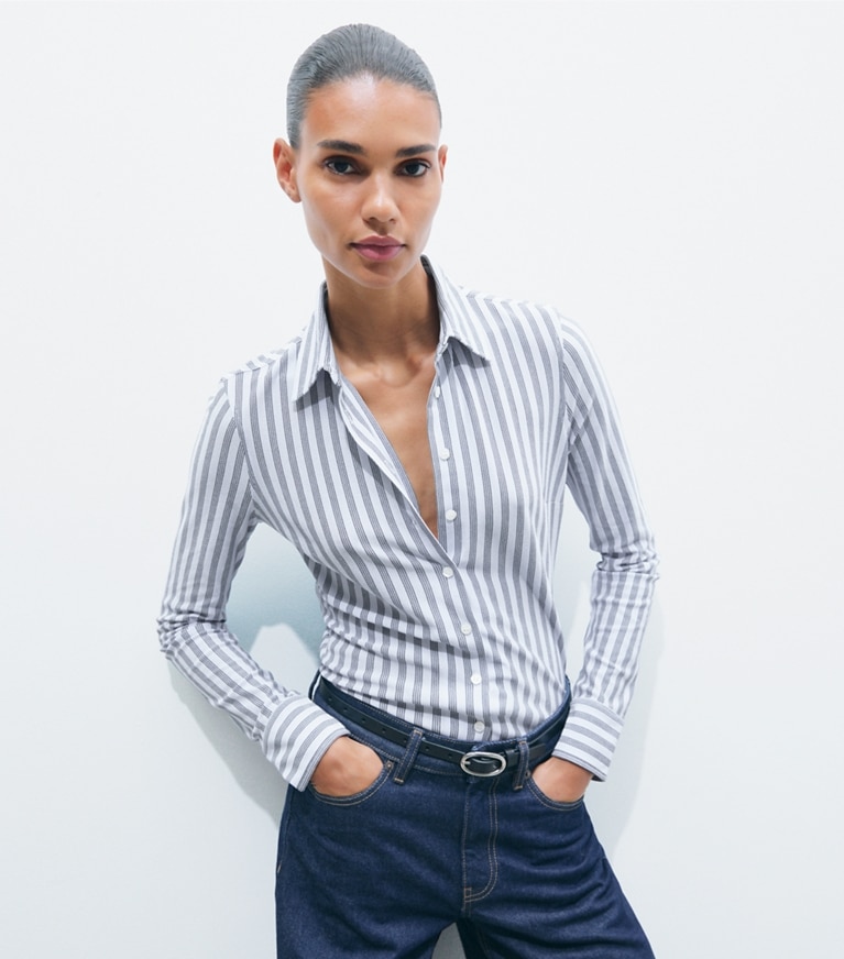 Tory Burch designer tops Striped Cotton Piqué Polo Shirt in Frozen Sky Stripe on model detail