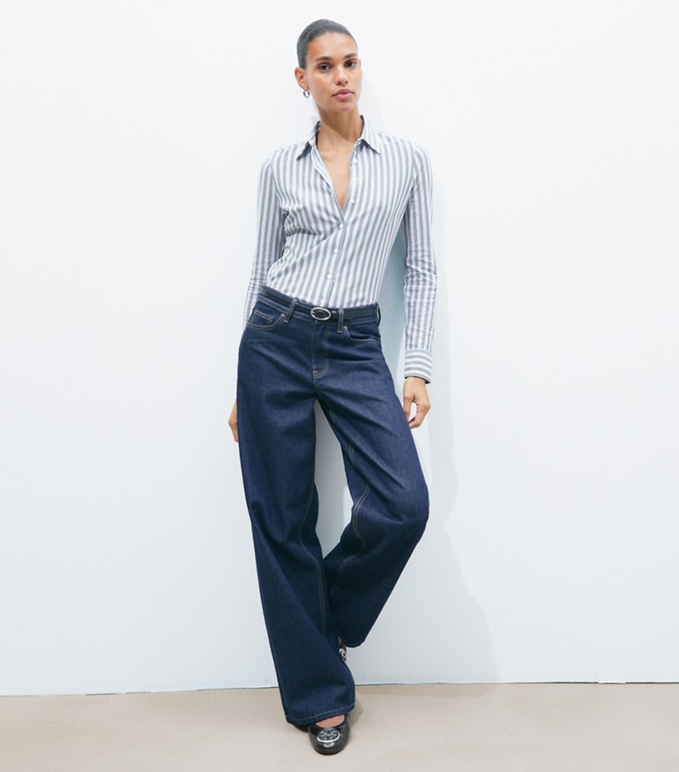 Tory Burch designer tops Striped Cotton Piqué Polo Shirt in Frozen Sky Stripe on model front