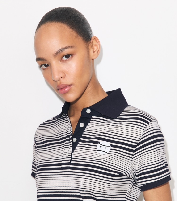Tory Burch designer tops Striped Cotton Polo in Medium Navy Stripe on model detail