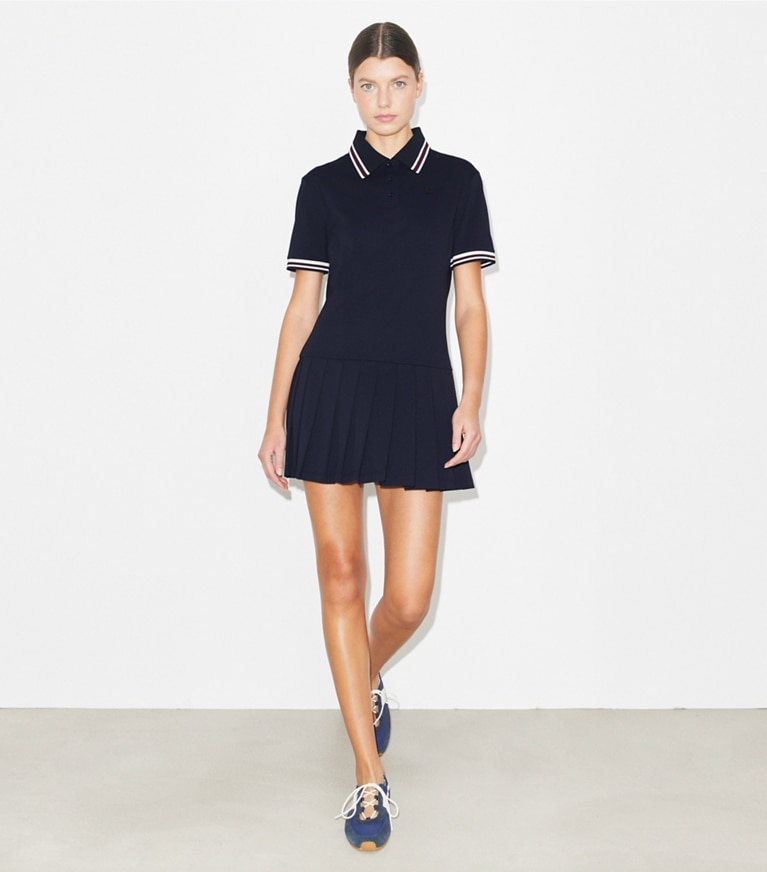 Tory Burch designer dresses Striped Rib Knit Polo Dress in Medium Navy on model front