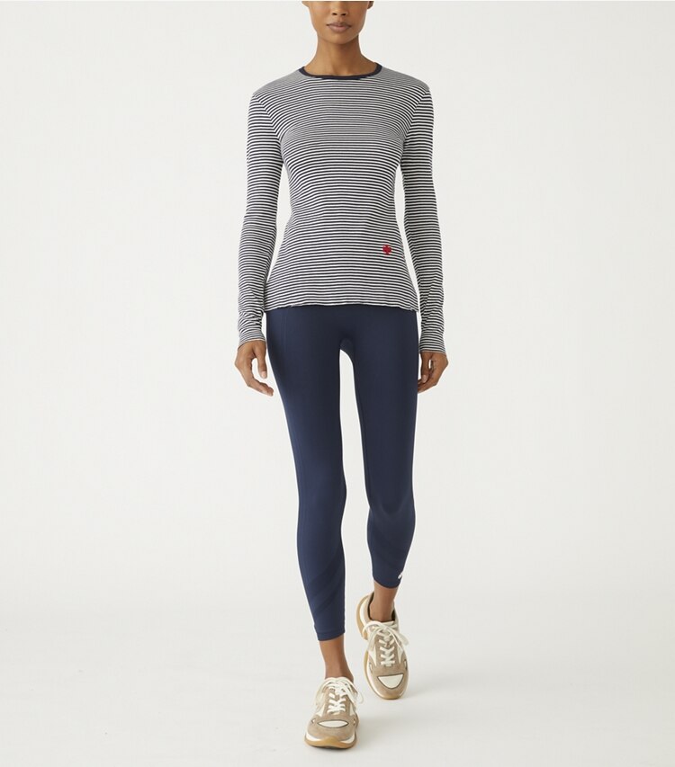 Tory Sport designer tops Striped Tissue-Weight Rib Long-Sleeve T-Shirt in Tory Navy Even Stripe on model front