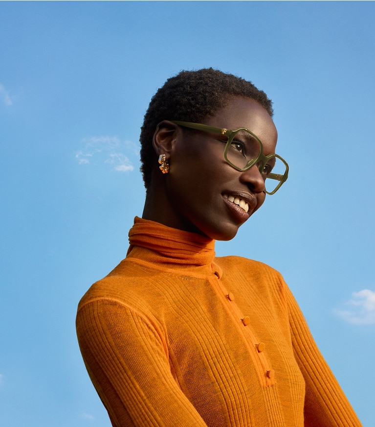 Tory Burch diseñador jerséis Suéter de canalé fino con lazo al frente en Marigold campaña