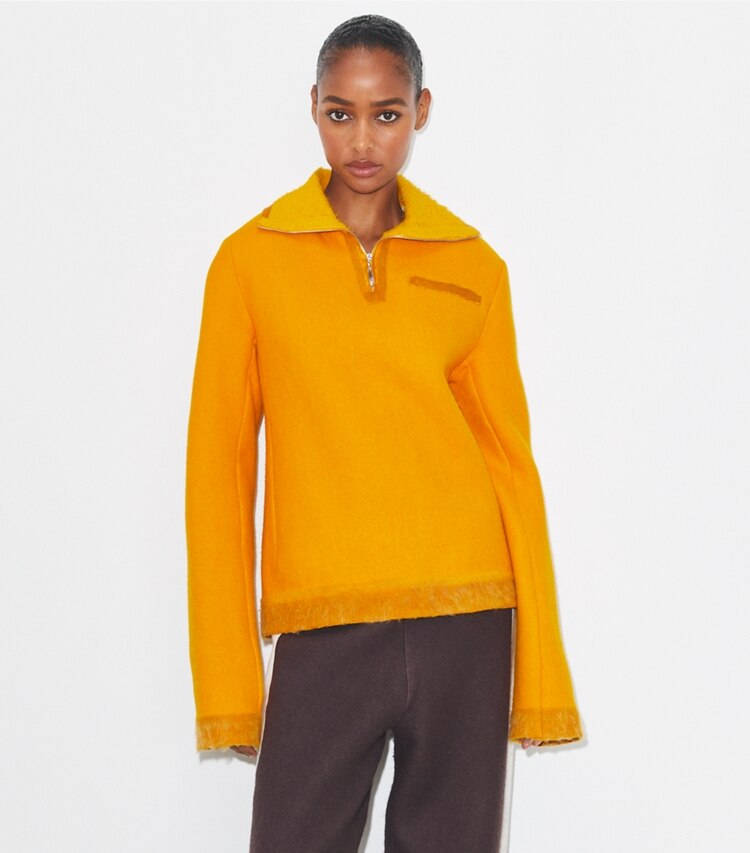 Tory Burch diseñador tops Sudadera de lana con media cremallera en Winter Sun detalle en modelo