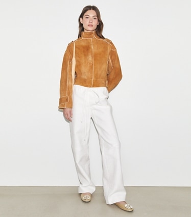 Tory Burch designer jackets Suede Bomber Jacket in Speckled Cinnamon on model front
