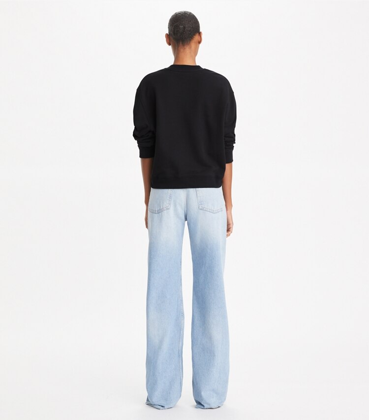 Tory Burch designer sweaters Sweatshirt à logo pavé de cristaux in Black on model back