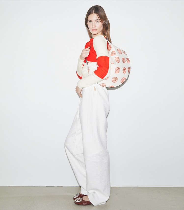 Tory Burch designer hobo bags T Monogram Balloon Bag in White / Pepperoncini additional on model