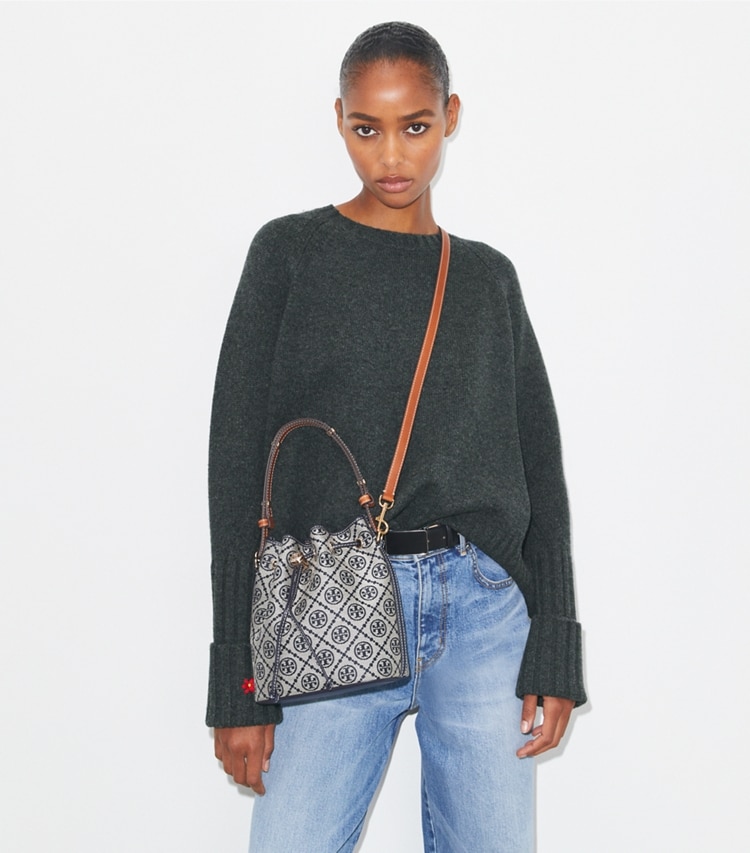 Tory Burch designer crossbody bags T Monogram Bucket Bag in Tory Navy accessory on model
