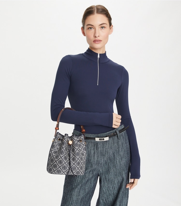 Tory Burch designer crossbody bags T Monogram Bucket Bag in Tory Navy additional on model