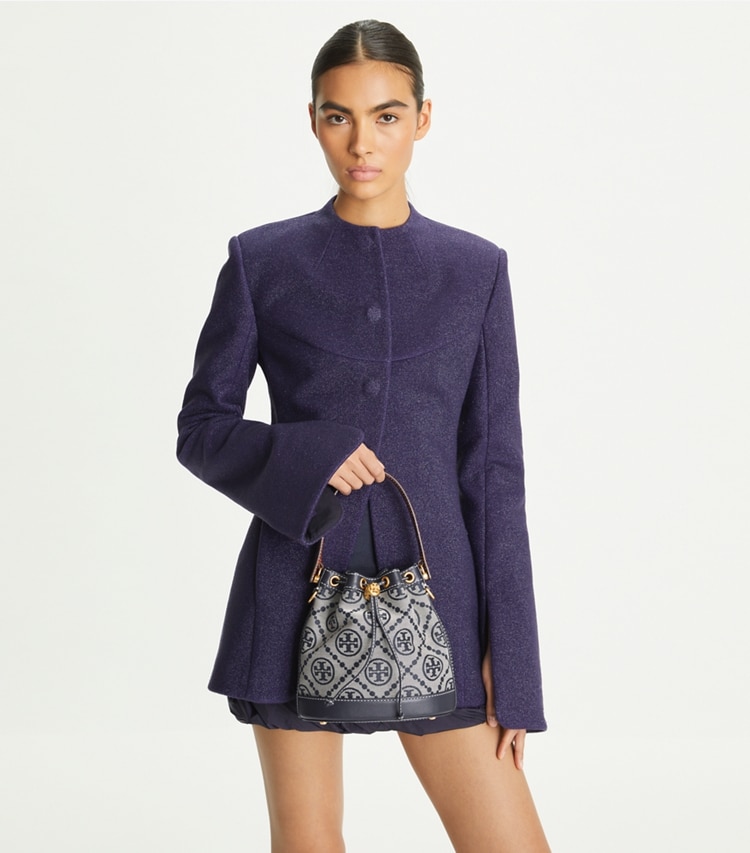 Tory Burch designer crossbody bags T Monogram Bucket Bag in Tory Navy additional on model
