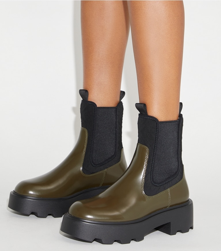 Tory Burch designer ankle boots T Monogram Chelsea Lug Boot in DARK OLIVE angle